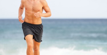 WEB-bigstock-Running-man-jogging-on-beach--45243595