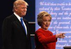 Democratic nominee Hillary Clinton (R) gestures next to Republican nominee Donald Trump during the first presidential debate at Hofstra University in Hempstead, New York on September 26, 2016. / AFP / Timothy A. CLARY        (Photo credit should read TIMOTHY A. CLARY/AFP/Getty Images)